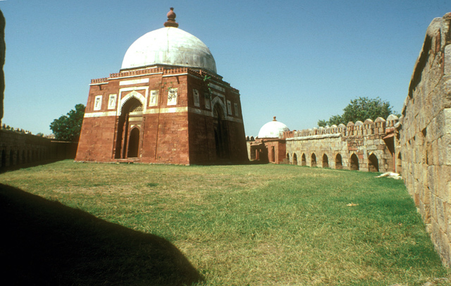 Mausoleum of Ghiyath al-Din Tughluq - Exterior view of tomb building taken from within the complex enclosure