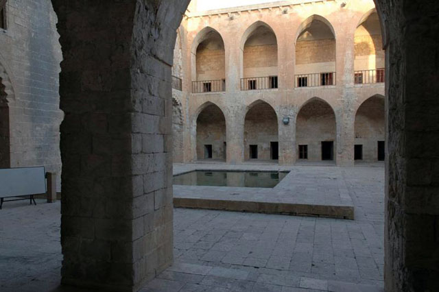 View of madrasa courtyard looking east from west arcade