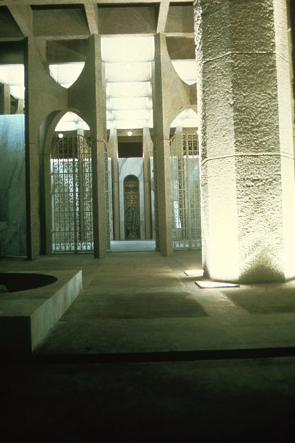 Interior view showing corner of fountain and screened entrance
