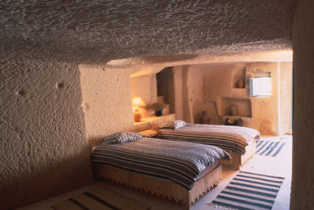 Interior view showing stucco walls in sleeping quarters