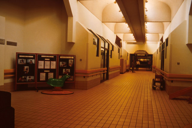 Interior view showing hall with recessed lighting