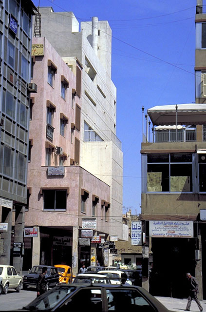 View along a narrow street to the south façade