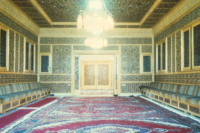 Interior view showing extravagantly painted and inlaid walls of reception