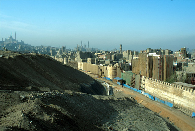 Elevated view looking southwest from al-Azhar Park construction site towards the school during restoration. The Muhammad Ali Mosque and the Citadel appear in the left background
