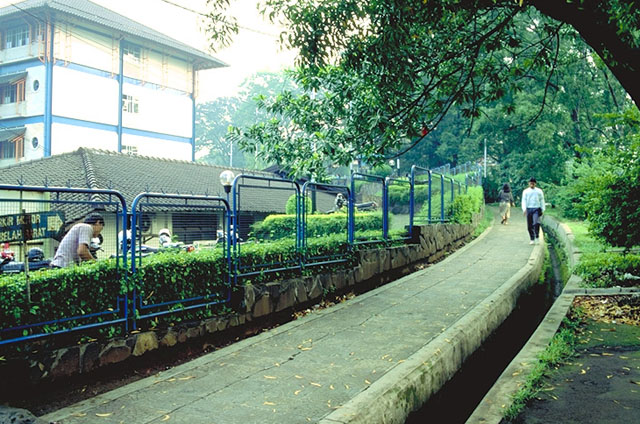 Landscaped pedestrian paths circle the campus