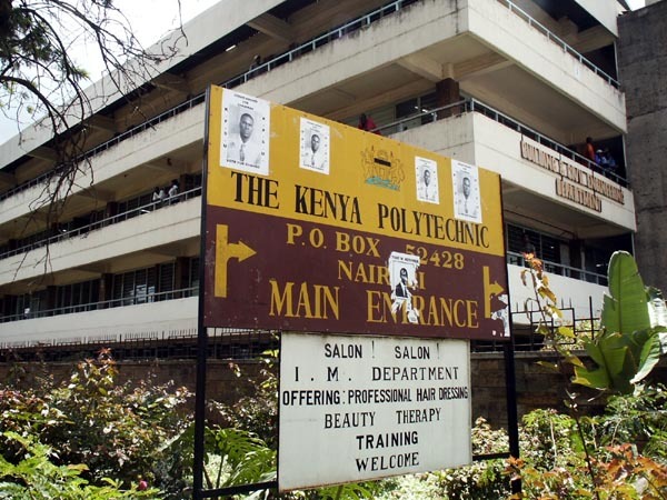 Exterior view of main building, with welcome sign