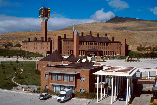 Exterior view showing complex's brick buildings