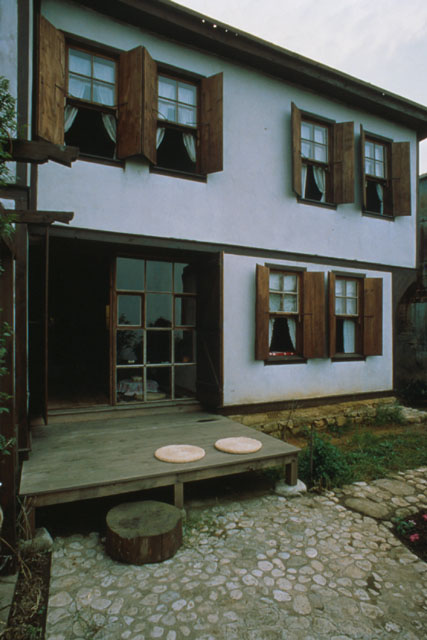 Exterior view showing wooden framed windows
