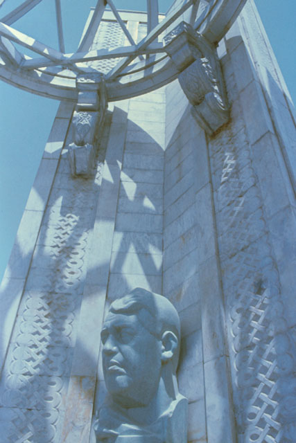 Exterior detail showing monument's carved backdrop