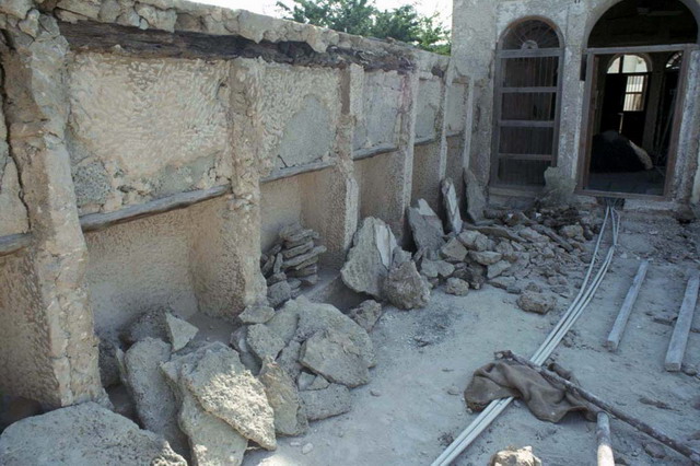Damaged parapet of roof terrace, during renovation
