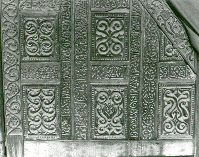 Detail of wooden minbar, carved patterns on the left side panel