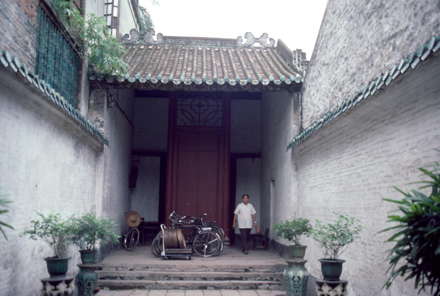 View of narrow courtyard at the southern entrance, looking towards the street