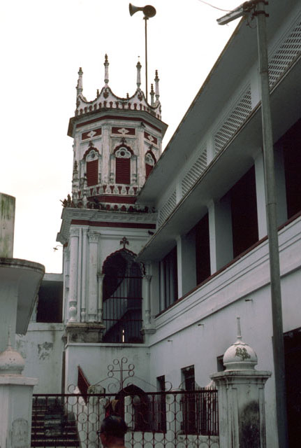 View from north. Stairs leading past the madrasa and up the entry tower to the prayer level