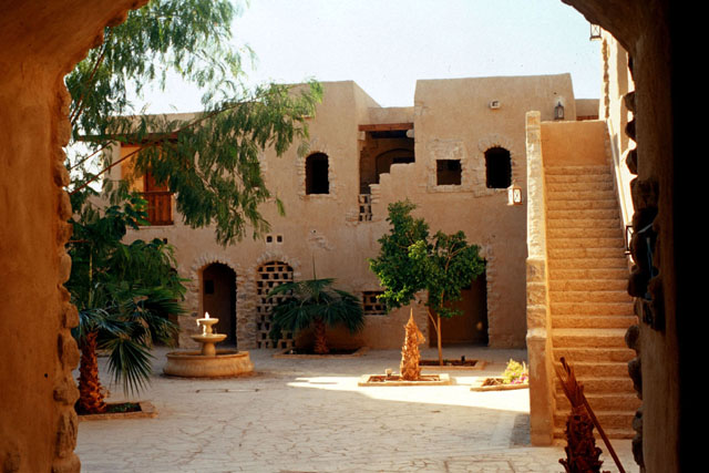Exterior view from entrance way into courtyard