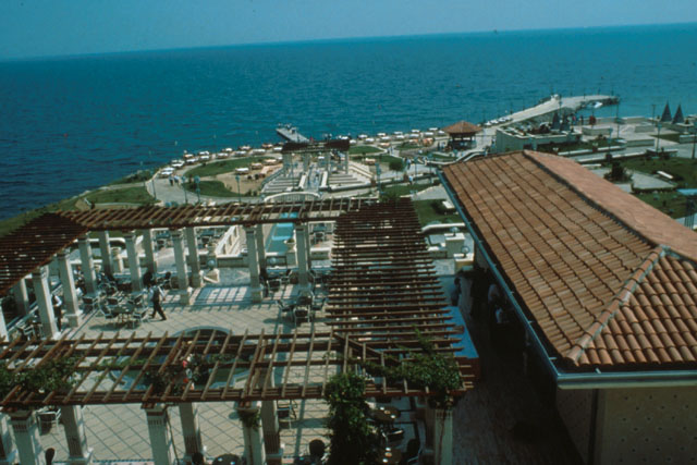 Elevated view showing complex's proximity to the sea