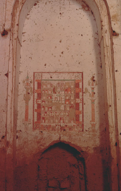 Interior detail of the western wall, showing central niche with painted depiction of a walled city and two minarets