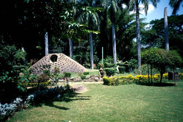 Exterior view showing gardens and pierced domical shelter
