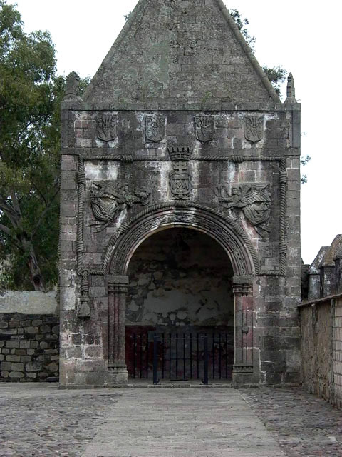 Exterior view of arched portal of the open-air chapel (Capilla Poza)