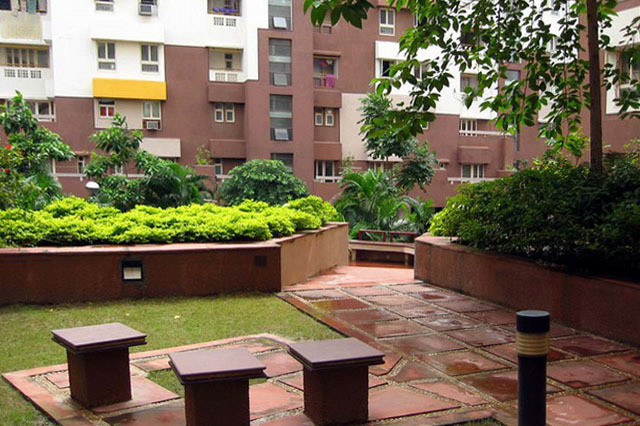 Landscaped entry court of an Udita apartment block