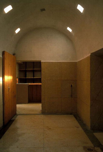 Interior view of restored bathhouse, vaulted room
