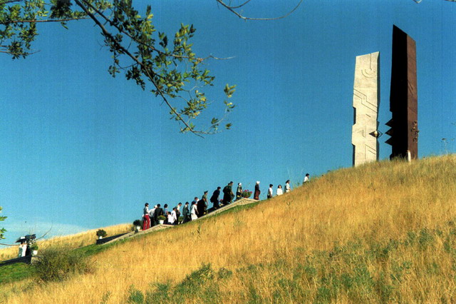 Visitors climbing the stairs to the monument