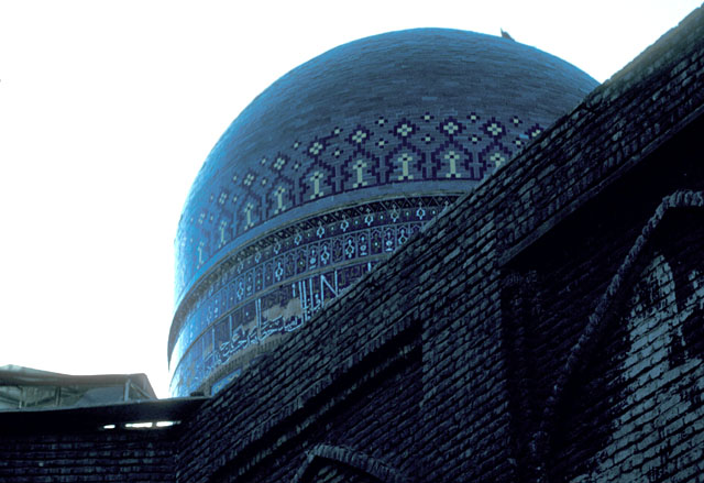 View of dome with tile mosaic and inscriptive band