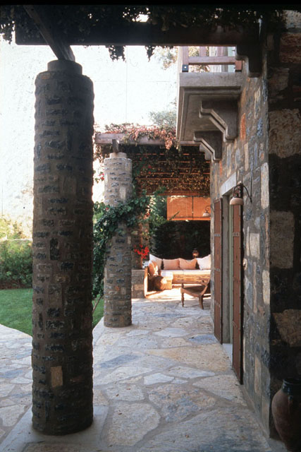 Exterior view, showing stone pillar