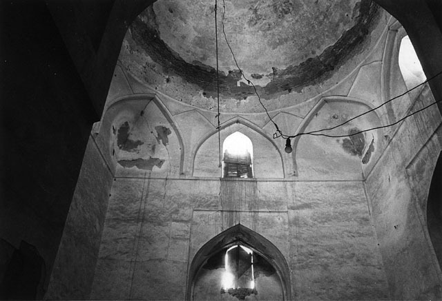 Interior view looking up at dome and zone of transition with squinches