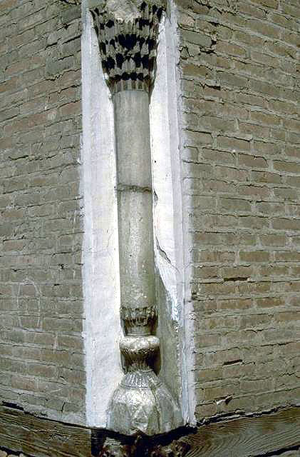 Exterior detail of alabaster pilaster on entrance portal