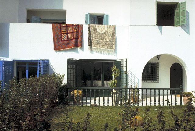 Private balconies and patios on the rear façade