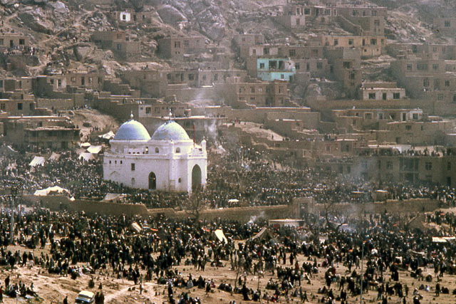 Elevated view showing shrine surrounded by pilgrims during Nauroz celebrations