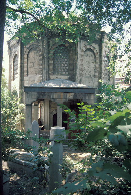 View of tomb with portico in front, looking west