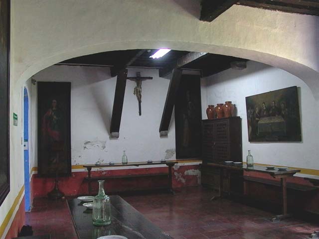 Interior view of kitchen with low-rise arch