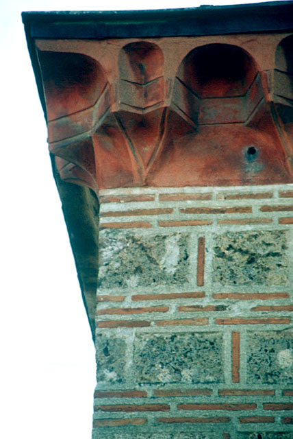 Exterior detail showing muqarnas cornice of portico