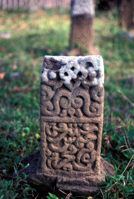 Broken unidentified early gravestone, estimated to date from the 14th or 15th century