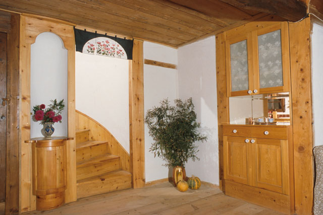 Interior view showing wooden built-in cabinets