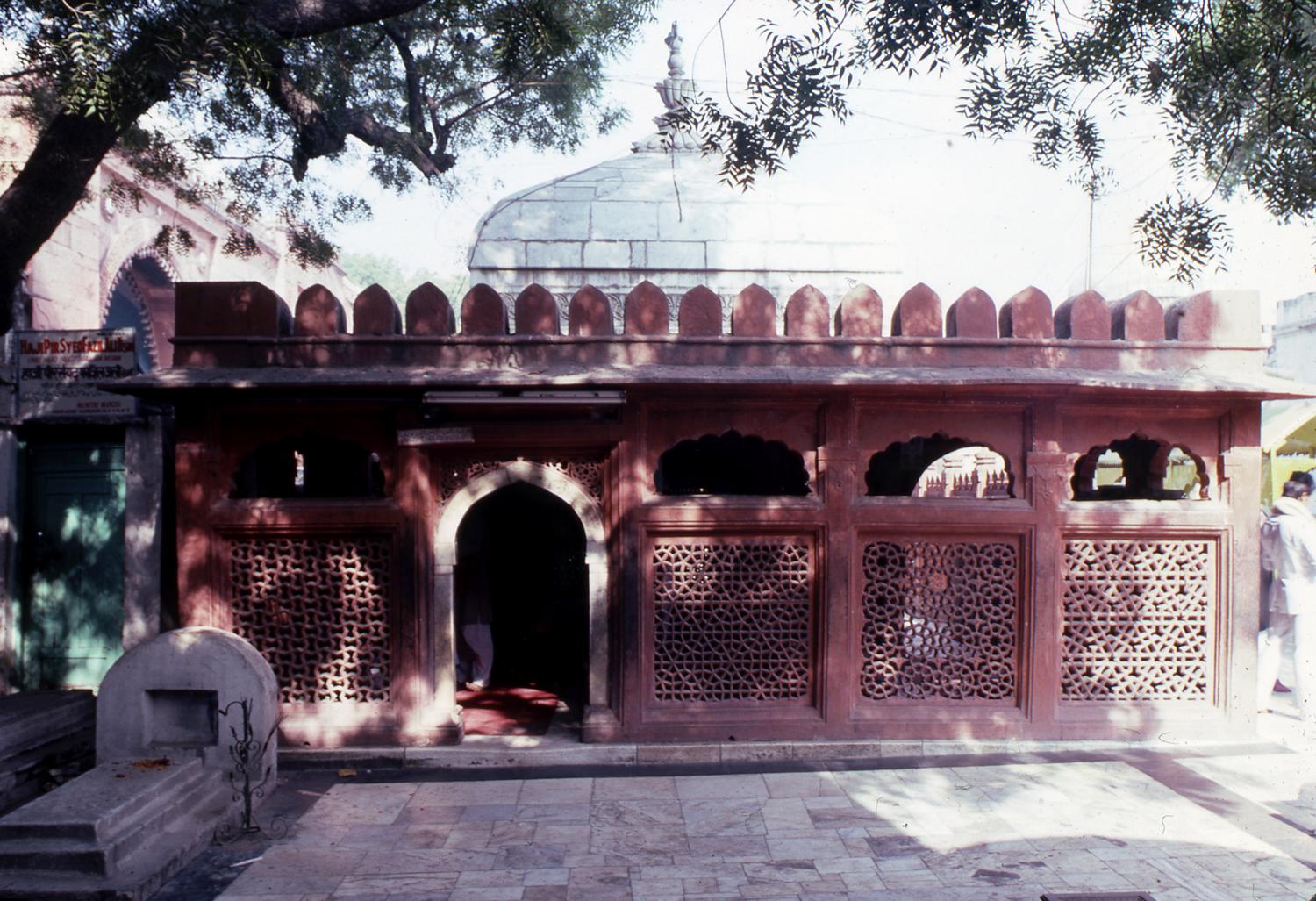 Exterior view of Amir Kushroo Tomb showing screen façade
