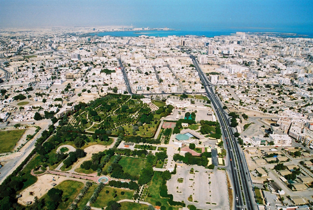 Aerial view over Doha showing greenspace