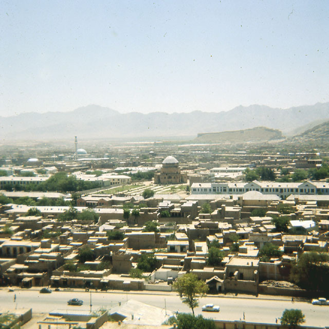 Elevated view from northwest showing mausoleum and gardens (center) in its urban context.  Pul-e Kheshti Mosque appears in the left background