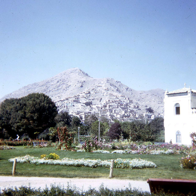 View of landscaped Zarnegar gardens, with mausoleum seen partially at right