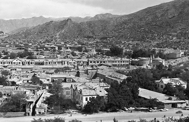 Elevated view of the city looking south from the Asamayi heights. Shah do Shamshira Mosque is seen along the Kabul River (center right) while the Sher Darwaza Hill appears in the background