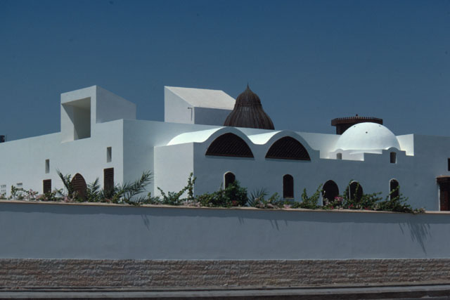 Exterior view showing contrasting rounded and square forms