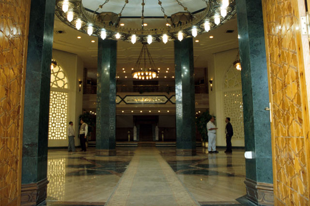 Interior view showing marble clad pillars, flooring and incised stone partitions
