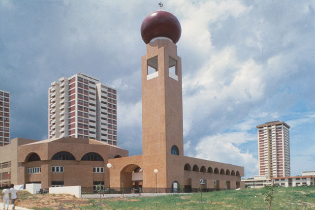 Exterior view showing spherical dome atop minaret