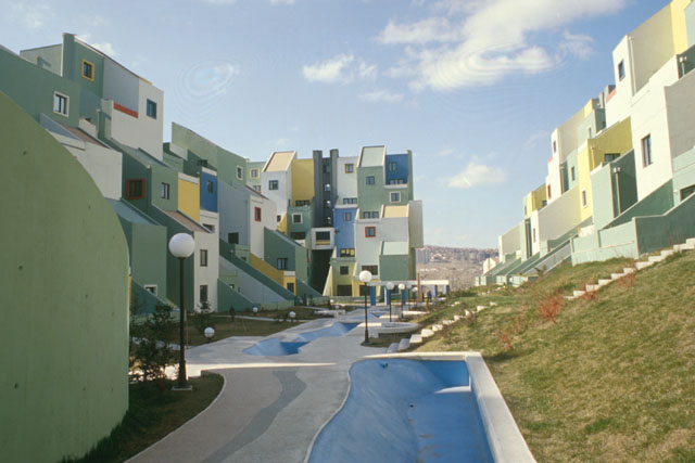 Exterior view showing painted modular façades
