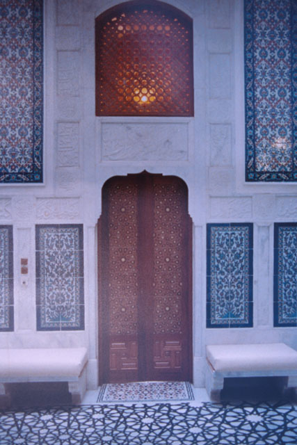 Detail of wood and tiled entrance