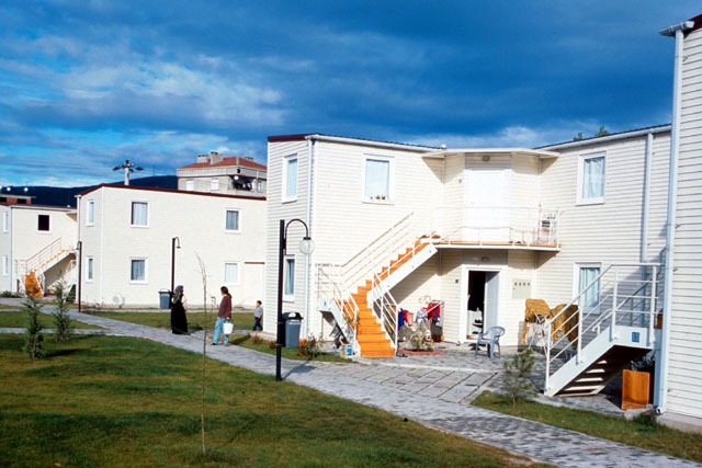 Exterior view of façades and pathways through residences