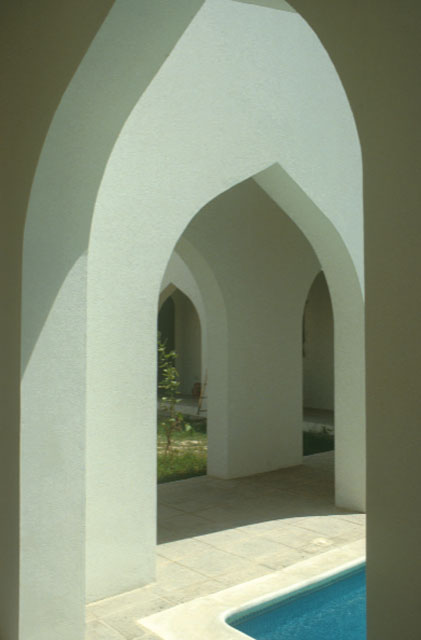 Arched arcade around the pool