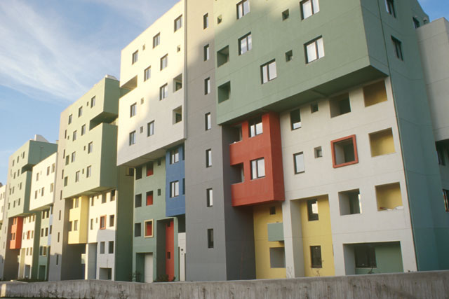 Exterior view showing painted modular façades