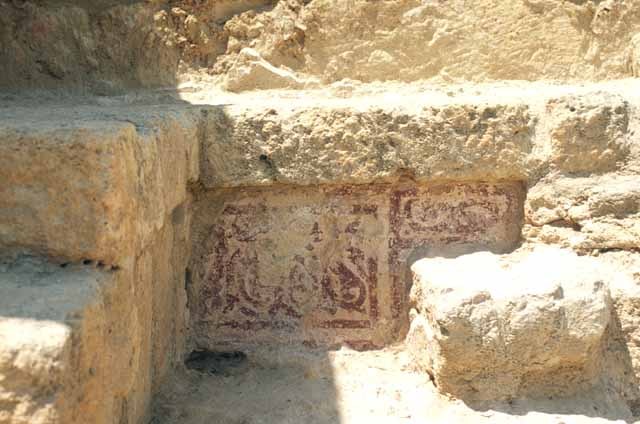 Red and white painted stucco ornament, residential quarters west of Dar al-Jund